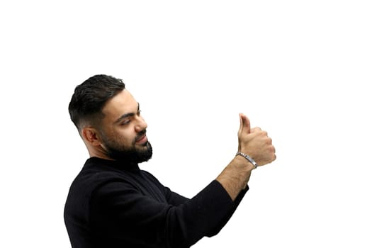 A man, close-up, on a white background, shows his thumbs up.