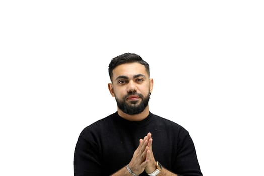 A man, close-up, on a white background, pleads.