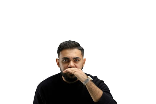 A man, close-up, on a white background, tells a secret.