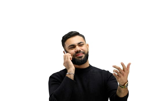 Man, close-up, on a white background, talking on the phone.