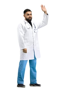 The doctor, in full height, on a white background, waving his hand.