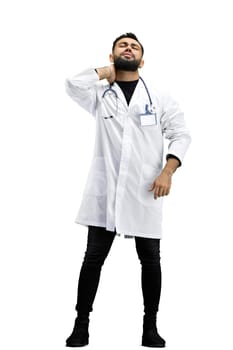 The doctor, in full height, on a white background, tired.