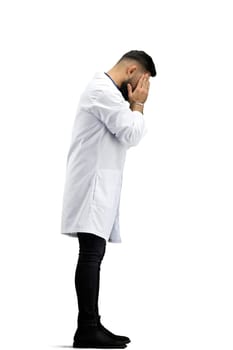 The doctor, in full height, on a white background, tired.
