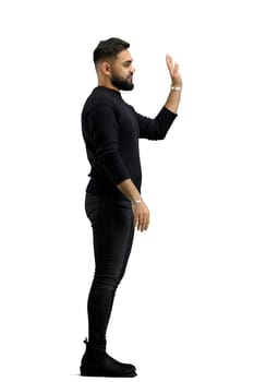 A man, full-length, on a white background, waving his hand.