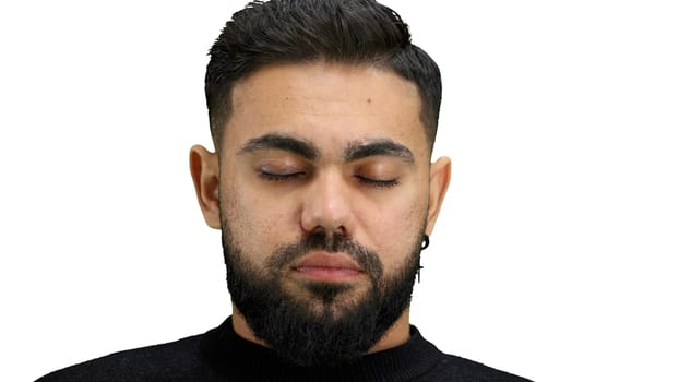 Man's face, close-up, on a white background.
