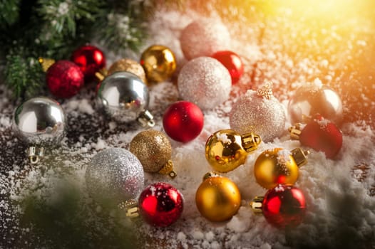 fir tree branches and decorations in Christmas and New Year concept. closeup at decoration balls