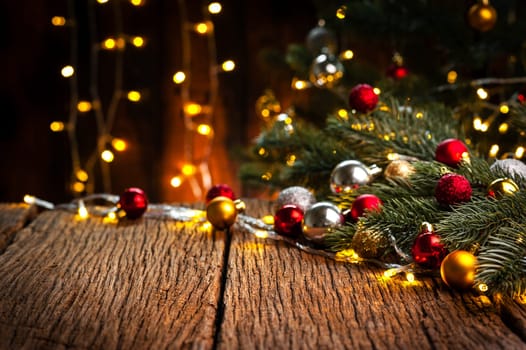 wooden table with fir tree and decorations in the background. Christmas and New Year concept