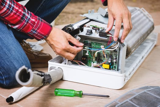 Air conditioning service, repair & maintenance concept. closeup at an indoor unit coil.