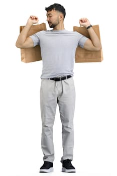 A man, full-length, on a white background, with bags.