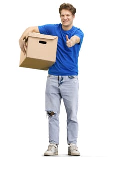 The deliveryman, in full height, on a white background, with a box, shows a thumbs up.