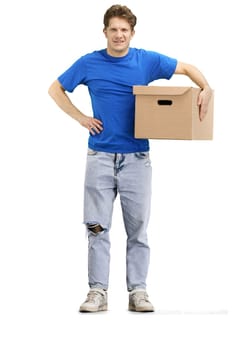 Delivery man, full-length, on a white background, with a box, hand on hip.