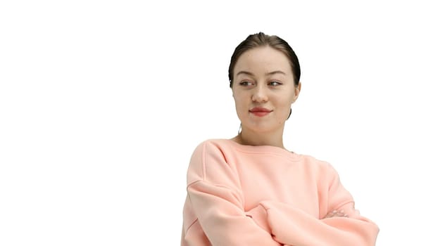 A woman, close-up, on a white background, crossed her arms.
