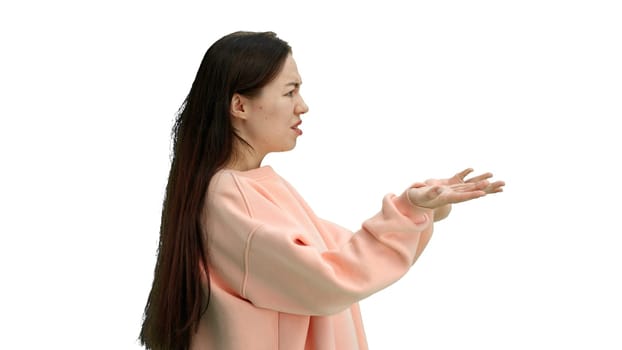 A woman, close-up, on a white background, spreads her arms.