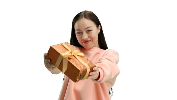 Woman, close-up, on a white background, with a gift.