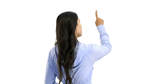 Woman, close-up, on a white background, pointing up.