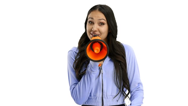 Woman, close-up, on a white background, with a megaphone.