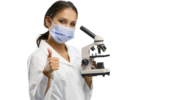 Female doctor, close-up, on a white background.