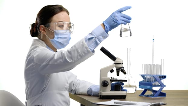 Female doctor, close-up, on a white background.