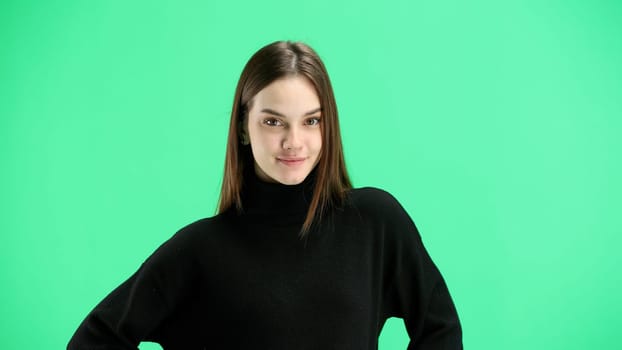 Woman, close-up, on a green background.