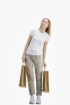 A woman, full-length, on a white background, with bags.