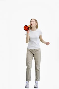 A woman, full-length, on a white background, with a megaphone.