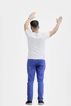 A man, full-length, on a white background, waving his arms.