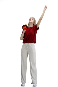 A woman, full-length, on a white background, with a megaphone.