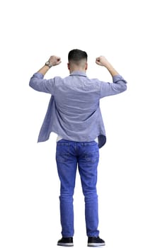 A man, full-length, on a white background, raised his hand up.