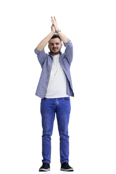 A man, full-length, on a white background, claps.