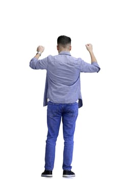 A man, full-length, on a white background, spreads his arms.