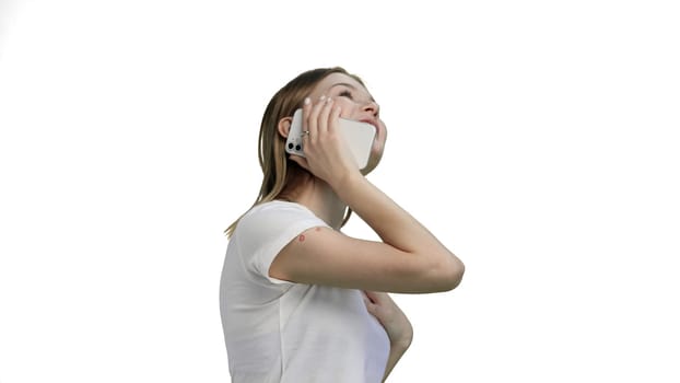 Woman, close-up, on a white background, using a phone.