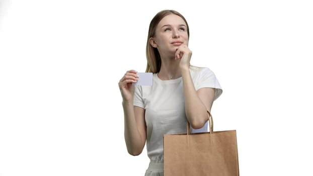 Woman, close-up, on a white background, with bags.