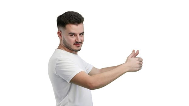 A man, close-up, on a white background, shows a thumbs up.