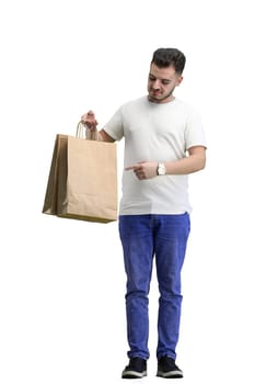 A man, full-length, on a white background, with bags.