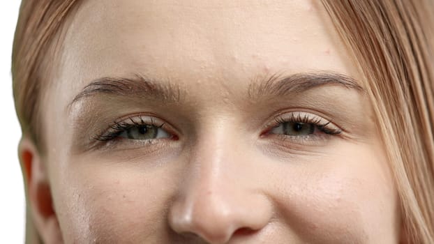 Woman's eyes, close-up, on a white background.