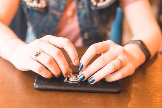 Mobile phone in female hands