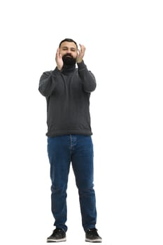 A man, full-length, on a white background, claps.