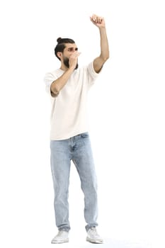 A man, full-length, on a white background, rejoices.