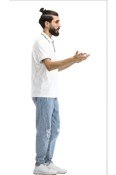 A man, full-length, on a white background, gestures.