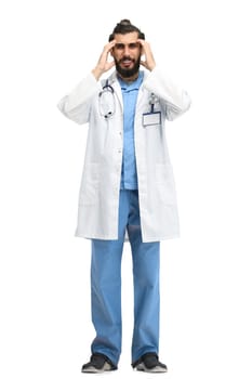 The male doctor, full-length, on a white background, thinks.