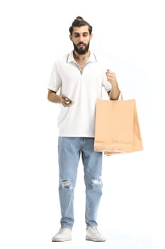 A man, full-length, on a white background, with bags.