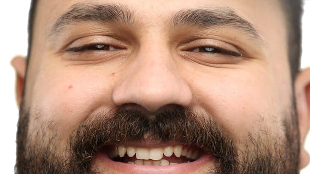 Man's eyes, close-up, on a white background.