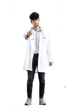 Male doctor, full-length, on a white background, shows a stop sign.