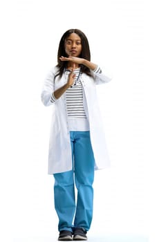 A full-length female doctor, on a white background, shows a pause sign.