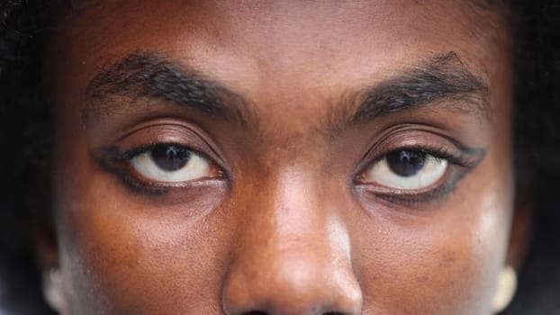 Close-up of a black womans eyes. Eyes of a thoughtful person