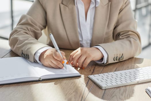 Professional woman at desk, working at computer with email and writing article at digital marketing agency.