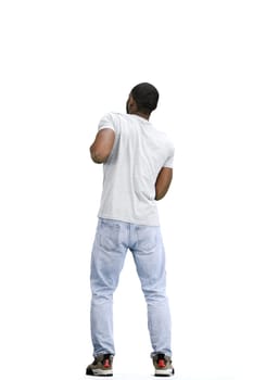 A man, full-length, on a white background, dancing.