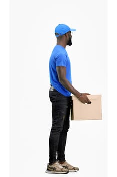 The deliveryman, full-length, on a white background, with a box.