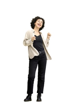 A woman, full-length, on a white background, dancing.