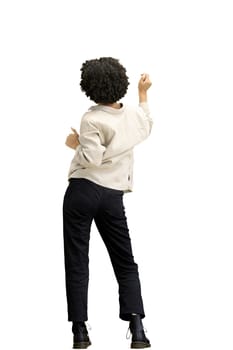 A woman, full-length, on a white background, dancing.